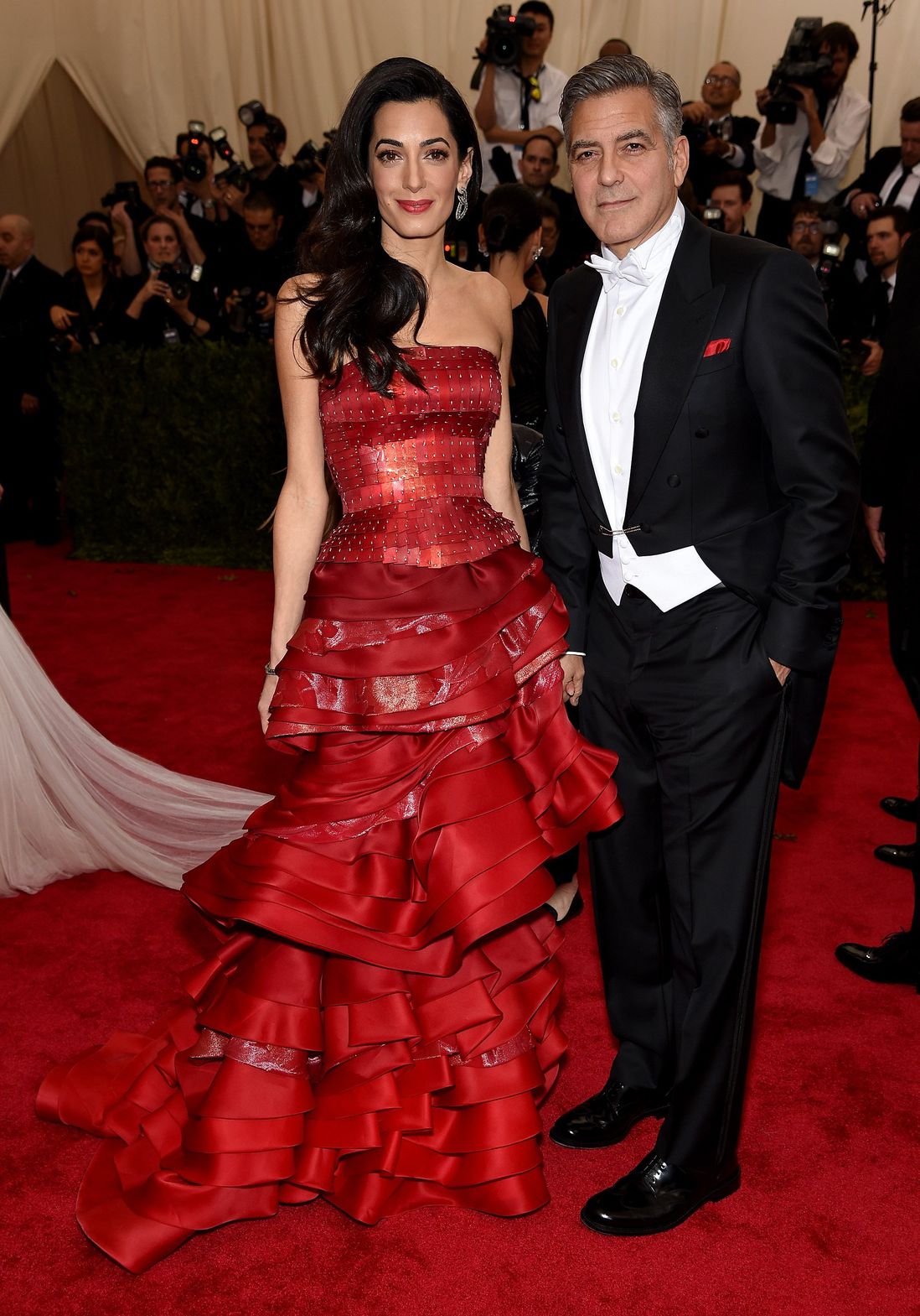 White gloveless Amal and George Clooney. The human rights lawyer is wearing John Galliano for Maison Margiela. <br/>